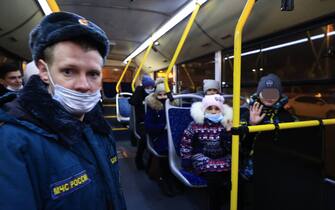 VOLZHSKY, VOLGOGRAD REGION, RUSSIA - FEBRUARY 20, 2022: People evacuated from the Donetsk and Lugansk People's Republics are seen on a bus at a railway station ahead of departing for temporary accommodation facilities. Amid the escalating conflict in east Ukraine, on February 18, 2022, the heads of the Lugansk and Donetsk People's Republics announced a mass evacuation of civilians to Russia. The first train carrying 400 evacuated Donbass residents has arrived in the town of Volzhsky from Russia's Rostov-on-Don Region. Dmitry Rogulin/TASS

EDITORIAL USE ONLY. NO COMMERCIAL USE. NO ADVERTISING (Photo by Dmitry Rogulin\TASS via Getty Images)