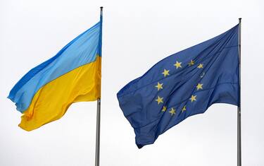 The Ukrainian and European Union flags are displayed at the Chancellery in Berlin on January 8, 2015 before the meeting of German Chancellor with Ukrainian Prime Minister. Angela Merkel meets with Arseniy Yatsenyuk  ahead of a scheduled mini-summit in Kazakhstan between the leaders of Russia, Ukraine and France next week. The Ukrainian forces have been battling pro-Russian separatist rebels for almost nine months in eastern Ukraine in a conflict in which more than 4,700 people have been killed. AFP PHOTO / JOHN MACDOUGALL (Photo by John MACDOUGALL / AFP) (Photo by JOHN MACDOUGALL/AFP via Getty Images)