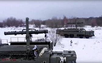 epa09709862 A handout photo taken from a handout video made available by the Russian Defense Ministry press service shows Russian Iskander missile launchers and support vehicles being used in planned comprehensive exercises on combat readiness with the troops of the Western Military District, Russia, 26 January 2022. About 3,000 servicemen of the Guards Red Banner Combined Arms Army of the Western Military District (ZVO) have begun combat training at training grounds in the Krasnodar, Voronezh, Belgorod, Bryansk and Smolensk regions.  EPA / RUSSIAN DEFENSE MINISTRY PRESS SERVICE / HANDOUT HANDOUT EDITORIAL USE ONLY / NO SALES