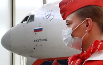 MOSCOW REGION, RUSSIA - APRIL 9, 2021: A flight attendant of Aeroflot - Russian Airlines is seen at a new hangar for maintenance of aircraft of Aeroflot Group, at Sheremetyevo International Airport.  Anton Novoderezhkin / TASS / Sipa USA
