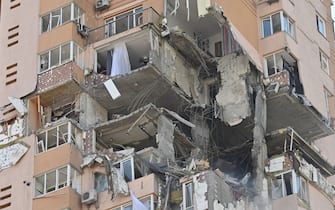 A view of a high-rise apartment block which was hit by recent shelling in Kyiv on February 26, 2022. (Photo by GENYA SAVILOV / AFP) (Photo by GENYA SAVILOV/AFP via Getty Images)