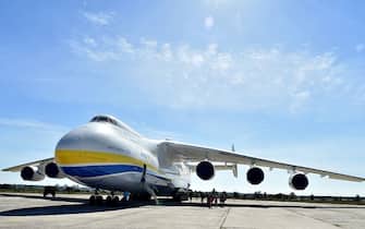 An Antonov-225 Mriya plane is seen at Antonov plant's airdrome Gostomel, some 30 km from Kiev during press-tour on September 8, 2016.
Ukraine hopes to attract $500 million of investment from China to complete an updated version of the world's biggest aircraft, the Antonov-225 Mriya, the president of manufacturer Antonov said on September 7, 2016. The Antonov-225 is a cargo plane designed as part of the former Soviet Union's space programme. The only one completed is still in use and can carry up to 250 tonnes up to 4,000 km / AFP / SERGEI SUPINSKY        (Photo credit should read SERGEI SUPINSKY/AFP via Getty Images)