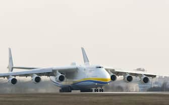 Worlds largest aircraft, the Antonov An-225 Mriya cargo airplane, takes off from the Antonov plant's airdrome in Gostomel, some 30 kilometers from Kiev on April 3, 2018. The aircraft is heading to the German city of Leipzig from where it will conduct its first commercial flight following checks.  / AFP PHOTO / GENYA SAVILOV (Photo credit should read GENYA SAVILOV / AFP via Getty Images)