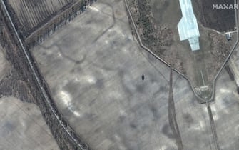 RUSSIANS INVADE UKRAINE -- FEBRUARY 28, 2022:  03 Maxar satellite imagery of southern end of large military convoy on the east edge of Antonov Airport.  28feb2022_wv3.   Please use: Satellite image (c) 2022 Maxar Technologies.