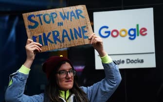 People take part in a protest outside Google head office in Dublin. Ukrainians living in Ireland along with supporters held protests outside the head offices of Meta and Google in Dublin calling on the companies to do more to tackle Russian state-backed acounts and the spread of disinformation. Picture date: Wednesday March 2, 2022.