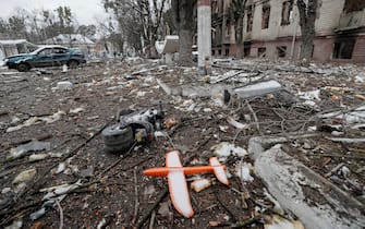 epa09793539 A toy plane sits among the rubble in the aftermath of an overnight shelling on Ukrainian military facilities in Brovary near Kiev (Kyiv), Ukraine, 01 March 2022. Russian troops entered Ukraine on 24 February prompting the country's president to declare martial law and triggering a series of announcements by Western countries to impose severe economic sanctions on Russia.  EPA/SERGEY DOLZHENKO