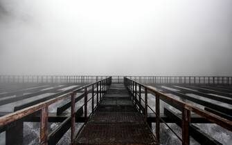 Zaporizhzhia July 10, 2019, Enerhodar, Zaporizhzhia Region, Ukraine: A mist rises from numerous jets of water inside a cooling tower at the Zaporizhzhia Nuclear Power Plant, Enerhodar, Zaporizhzhia Region, southeastern Ukraine, July 10, 2019. Ukrinform. (Credit Image: © Dmytro Smolyenko/Ukrinform via ZUMA Wire)