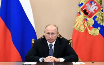 Russian President Vladimir Putin chairs a Security Council meeting via video conference in Moscow, Russia, Friday, Nov. 6, 2020. (Alexei Nikolsky, Sputnik, Kremlin Pool Photo via AP)