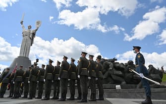 Honour guards servicemen take part in a ceremony at the open air museum of Kiev, in May 9, 2021, as European  countries celebrate the 76th anniversary of Victory in Europe (VE-Day), marking the end of World War II in Europe on May 8, 2021. (Photo by Sergei SUPINSKY / AFP) (Photo by SERGEI SUPINSKY/AFP via Getty Images)