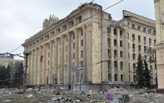 TOPSHOT - This general view shows the damaged local city hall of Kharkiv on March 1, 2022, destroyed as a result of Russian troop shelling. - The central square of Ukraine's second city, Kharkiv, was shelled by advancing Russian forces who hit the building of the local administration, regional governor Oleg Sinegubov said. Kharkiv, a largely Russian-speaking city near the Russian border, has a population of around 1.4 million. (Photo by Sergey BOBOK / AFP) (Photo by SERGEY BOBOK/AFP via Getty Images)