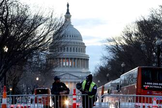 WASHINGTON, DC - MARCH 01: U.S. Capitol police officers stand guard near the U.S. Capitol on March 01, 2022 in Washington, DC. Security around the U.S. Capitol building has been increased in anticipation of U.S. President Joe Biden's first State of the Union address. (Photo by Justin Sullivan/Getty Images)