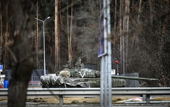 This general view shows a Russian tank in the city of Irpin, west of Kyiv, on March 4, 2022. - The UN Human Rights Council on March 4, 2022, overwhelmingly voted to create a top-level investigation into violations committed following Russia's invasion of Ukraine. More than 1.2 million people have fled Ukraine into neighbouring countries since Russia launched its full-scale invasion on February 24, United Nations figures showed on March 4, 2022. (Photo by ARIS MESSINIS / AFP) (Photo by ARIS MESSINIS/AFP via Getty Images)