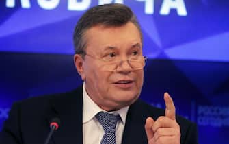 epa07347662 Former Ukrainian President Viktor Yanukovich speaks during a press conference in Moscow, Russia, 06 February 2019. Media reports citing a lawyer for Yanukovic say that he was to talk about 'issues of Ukrainian politics'.  EPA/SERGEI ILNITSKY