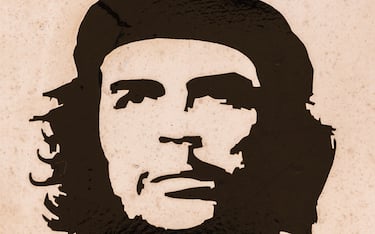 The iconic & unmistakable face of Che Guevara - famous for leading the Cuban revolution in the 1950's, seen on the side of white pick-up truck in Trinidad.
