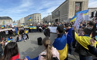 BRUSSELS, BELGIUM - MARCH 13: Protesters holding Ukrainian flags and banners gather at Square Albertine to stage a demonstration as they provide support to Ukraine and protest Russian attacks, in Brussels, Belgium on March 13, 2022. (Photo by Dursun Aydemir/Anadolu Agency via Getty Images)