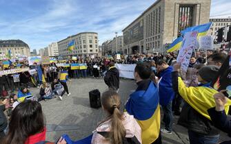 1239156289 BRUSSELS, BELGIUM - MARCH 13: Protesters holding Ukrainian flags and banners gather at Square Albertine to stage a demonstration as they provide support to Ukraine and protest Russian attacks, in Brussels, Belgium on March 13, 2022. (Photo by Dursun Aydemir/Anadolu Agency via Getty Images)