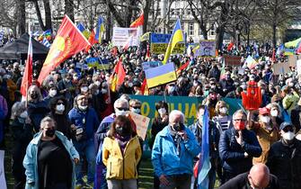 People take part in a demonstration against the war in Ukraine in Stuttgart, southern Germany, on March 13, 2022. (Photo by THOMAS KIENZLE / AFP) (Photo by THOMAS KIENZLE/AFP via Getty Images)