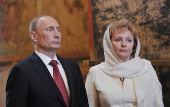 Russia's President Vladimir Putin and his wife Lyudmila attend a service at Blagoveshchensky (the Annunciation) cathedral  in Moscows Kremlin, on May 7, 2012, after Putin's inauguration ceremony. Putin took his oath of office today to become Russia's president for a historic third mandate at a glittering ceremony inside the Kremlin. AFP PHOTO/ RIA-NOVOSTI/ ALEXEI NIKOLSKY (Photo by ALEXEI NIKOLSKY / RIA-NOVOSTI / AFP) (Photo by ALEXEI NIKOLSKY/RIA-NOVOSTI/AFP via Getty Images)