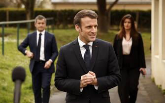 Gerald France's Interior Minister Gerald Darmanin (L) and France's Junior Minister of Citizenship Marlene Schiappa (R) listen to French President Emmanuel Macron as he gives a press conference during a visit at a centre for refugees from Ukraine, in La Pommeraye, near Mauges-sur-Loire, on March 15, 2022. - The center, run by the group France Horizon, is housing around fifty refugees who arrived on March 12, after fleeing the conflict in Ukraine. 

# JBT45 (Photo by Yoan VALAT / POOL / AFP) (Photo by YOAN VALAT/POOL/AFP via Getty Images)