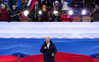 epa09833706 Russian President Vladimir Putin delivers a speech during a concert marking the 8th anniversary of Crimea's reunification with Russia at the Luzhniki stadium in Moscow, Russia, 18 March 2022. Russia in 2014 annexed the Black Sea peninsula, shortly after Crimeans voted in a disputed referendum to secede from Ukraine.  EPA/ALEXANDER VILF / POOL MANDATORY CREDIT