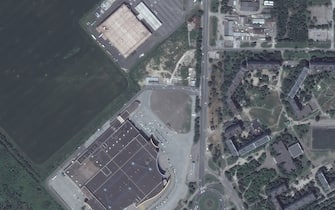 RUSSIANS INVADE UKRAINE -- JUNE 21, 2021:  05 Maxar satellite imagery of portcity shopping mall and other stores BEFORE invasion, western Mariupol, Ukraine.  21June2021_wv2.  Please use: Satellite image (c) 2022 Maxar Technologies.