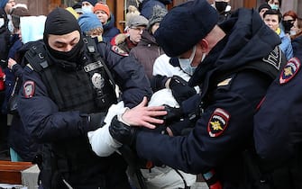 MOSCOW, RUSSIA - MARCH 6, 2022: Law enforcement officers detain a person during an unsanctioned protest against the special military operation announced by Russia's President Putin in Ukraine on February 24 in response to appeals for help from the leaders of the Donetsk and Lugansk People's Republics. Vyacheslav Prokofyev/TASS/Sipa USA