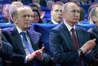epa08746757 (FILE) - Russian President Vladimir Putin (R) and Federal Security Service Director Alexander Bortnikov (L) attend a concert marking Russian Security Service Officer Day, in Moscow, Russia, 19 December 2019 (reissued 15 October 2020).  The European Union puts Director of Russia's FSB Alexander Bortnikov, First Deputy Chief of Staff of the Presidential Administration Sergei Kiriyenko and four other high-ranking Russian officials on the EU's blacklist against Russia over the alleged poisoning of blogger Alexey Navalny, the Council of the European Union said.  EPA / ALEXEI DRUZHININ / SPUTNIK / KRE MANDATORY CREDIT
