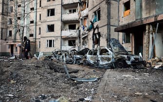 Kiev, Ukraine - March 20, 2022 - Burnt-out cars are pictured outside a residential building damaged as a result of shelling by Russian troops in Sviatoshynskyi district, Kyiv, capital of Ukraine. Photo by Oleksandra Butova/Ukrinform/ABACAPRESS.COM