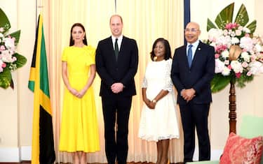 epa09843311 The Duke and Duchess of Cambridge, William (2L) and Catherine (L), pose with the Governor General of Jamaica, Patrick Allen (R), and his wife Patricia (2R), at Government House in Kingston, Jamaica, 23 March 2022. The dukes' trip to Jamaica will coincide with the 60th anniversary of the independence of this territory as a British colony and the celebration of the Platinum Jubilee of the monarch Elizabeth II for her 70 years on the throne.  EPA/Rudolph Brown