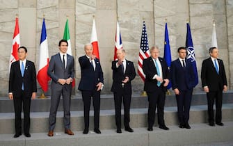 From left, NATO Secretary General Jens Stoltenberg, European Commission President Ursula von der Leyen, Japan Prime Minister Fumio Kishida, Canadian Prime Minister Justin Trudeau, U.S. President Joe Biden, German Chancellor Olaf Scholz, British Prime Minister Boris Johnson, French President Emmanuel Macron, Italian Prime Minister Mario Draghi and European Council President Charles Michel pose during a photo of the Group of Seven (G7) prior to a meeting at NATO Headquarters in Brussels, Belgium on Thursday, March 24, 2022. Photo by Sean Kilpatrick/CP/ABACAPRESS.COM
