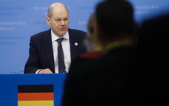 epa09849602 German Chancellor Olaf Scholz gives a press conference at the end of a two day European Council Summit in Brussels, Belgium, 25 March 2022. EPA / OLIVIER HOSLET