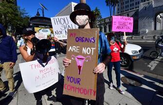 1239037185 Supporters and opponents of abortion rights confront each other on International Women's Day, March 8, 2022 in Los Angeles. - Activists gathered to oppose the growing assault on abortion rights ahead of a Supreme Court decision in Dobbs v. Jackson Women's Health Organization, expected in late spring, that could change abortion rights nationwide. (Photo by Frederic J. BROWN / AFP) (Photo by FREDERIC J. BROWN/AFP via Getty Images)