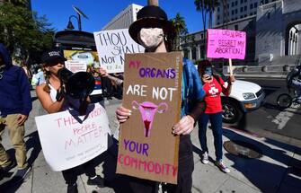 Supporters and opponents of abortion rights confront each other on International Women's Day, March 8, 2022 in Los Angeles. - Activists gathered to oppose the growing assault on abortion rights ahead of a Supreme Court decision in Dobbs v. Jackson Women's Health Organization, expected in late spring, that could change abortion rights nationwide. (Photo by Frederic J. BROWN / AFP) (Photo by FREDERIC J. BROWN/AFP via Getty Images)