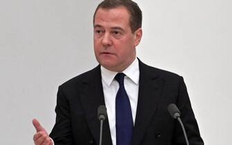 Deputy chairman of the Russian Security Council Dmitry Medvedev speaks during a meeting with members of the Security Council in Moscow on February 21, 2022. - Russian President Vladimir Putin said on February 21, 2022, he would make a decision 