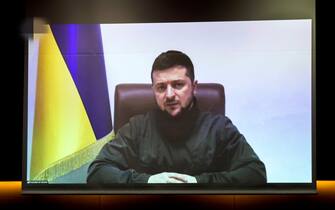 Ukrainian President Volodymyr Zelensky speaks to members of Japan's lower house of parliament via a video link at the House of Representatives office building in Tokyo on March 23, 2022. - Zelensky was expected to address Japan's Diet and the French National Assembly on March 23 via video link, after already speaking to the parliaments of Canada, Britain, the EU, Germany, Israel, Italy and the United States. (Photo by Behrouz MEHRI and BEHROUZ MEHRI / POOL / AFP) (Photo by BEHROUZ MEHRI/POOL/AFP via Getty Images)