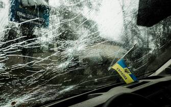 BUCHA, UKRAINE - 2022/04/03: A bullet-riddled car's windshield is seen in Bucha, a suburb north of Kyiv, where the war between Russian Federation forces and the Ukrainian Military took place. As Russian troops withdraw from areas north of Ukraine's capital city of Kyiv, Ukrainian forces and the media found evidence of significant numbers of civilian casualties. The Ukrainian authorities are calling the killing of civilians in Bucha and other areas a war crime. (Photo by Matthew Hatcher/SOPA Images/LightRocket via Getty Images)