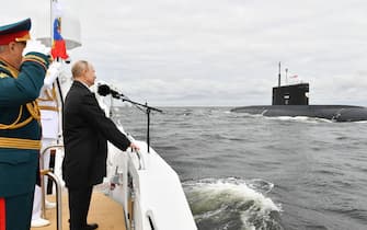 ST PETERSBURG, RUSSIA – JULY 25, 2021: Russia's Defence Minister Sergei Shoigu, Russian Navy Commander-in-Chief Admiral Nikolai Yevmenov, and Russia's President Vladimir Putin (L-R) review warships before the main naval parade marking Russian Navy Day in the Gulf of Finland. Alexei Nikolsky/Russian Presidential Press and Information Office/TASS/Sipa USA
