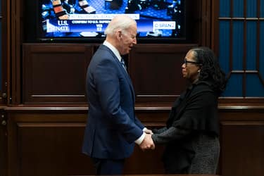epa09876536 US President Joe Biden hugs Associate Supreme Court Nominee Ketanji Brown Jackson after she passed the 50 vote thresh hold by the US Senate for her confirmation to the Supreme Court at the White House in Washington, DC, USA, 07 April 2022.  EPA/JOSHUA ROBERTS / POOL