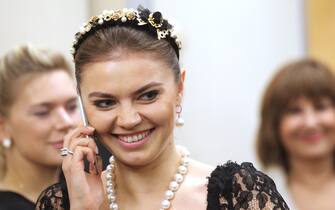 Russian retired rhytmic gymnast and politican Alina Kabaeva attends a reception at the Bocharov Ruchey state residence in Sochi, Russia, February, 8,2014. Putin called Russian athlets, musicians and artists for the reception to mark the begining of the 2014 Winter Olympics. (Photo by Sasha Mordovets/Getty Images)