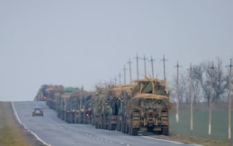 ROSTOV, RUSSIA - FEBRUARY 23: A convoy of Russian military vehicles is seen as the vehicles move towards border in Donbas region of eastern Ukraine on February 23, 2022 in Russian border city Rostov. (Photo by Stringer/Anadolu Agency via Getty Images)