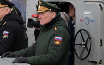 epa08114554 (L-R) Russian President and Armed Forces Supreme Commander-in-Chief Vladimir Putin, Commander-in-Chief of the Russian Navy Admiral Nikolai Yevmenov, and Commander of the Russian Army's Southern Military District Colonel General Alexander Dvornikov attend on board of the Russian Northern fleet's Marshal Ustinov missile cruiser watches the joint drills of the Northern and Black sea fleets in the Black Sea, Crimea, 09 January 2020. The exercise included Kalibr cruise missiles and Kinzhal hypersonic aero-ballistic ballistic missiles firing.  EPA/ALEXEI DRUZHININ / SPUTNIK / KREMLIN POOL MANDATORY CREDIT