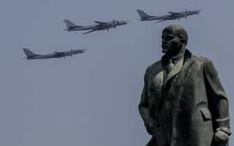 MOSCOW, RUSSIA - 2020/06/24: Russian Air Force Tupolev Tu-95MS bombers fly in formation over the Vladimir Lenin monument during the Victory Day military parade marking the 75th anniversary of the Nazi defeat in WWII on 24 Jun 2020. The parade was scheduled for May 9 but postponed due to the outbreak of the coronavirus (COVID-19) disease. (Photo by Leonid Faerberg/SOPA Images/LightRocket via Getty Images)