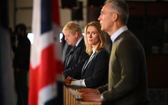 1238851793 TALLINN, ESTONIA - MARCH 01: Prime Minister of Estonia, Kaja Kallas looks on next to British Prime Minister Boris Johnson and Jens Stoltenberg, Secretary General of NATO, (R) during a joint press conference at the Tapa Army Base on March 1, 2022 in Tallinn, Estonia. British Prime Minister Boris Johnson travelled to Poland earlier today and is now in Estonia for further talks. (Photo by Leon Neal/Getty Images)