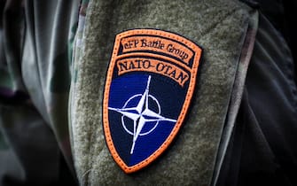NATO - OTAN badge is seen on a uniform of American soldier who attends a ceremony at the Kosciuszko Mound in Krakow, Poland, on August 4, 2020. The U.S. Army Chief of Staff announced today that V Corps Headquarters (Forward) will be located in Poland. (Photo by Beata Zawrzel/NurPhoto)