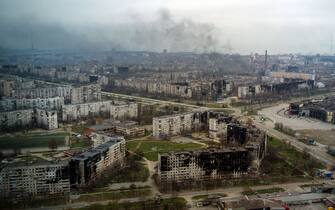 TOPSHOT - An aerial view taken on April 12, 2022, shows the city of Mariupol, during Russia's military invasion launched on Ukraine. - Russian troops on April 12 intensified their campaign to take the port city of Mariupol, part of an anticipated massive onslaught across eastern Ukraine, as the Russian president made a defiant case for the war on Russia's neighbour. (Photo by Andrey BORODULIN / AFP) (Photo by ANDREY BORODULIN/AFP via Getty Images)