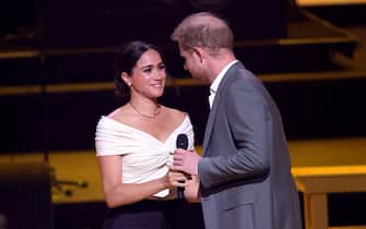 THE HAGUE, NETHERLANDS - APRIL 16: Prince Harry, Duke of Sussex and Meghan, Duchess of Sussex on stage during the Invictus Games The Hague 2020 Opening Ceremony at Zuiderpark on April 16, 2022 in The Hague, Netherlands.  (Photo by Chris Jackson / Getty Images for the Invictus Games Foundation)