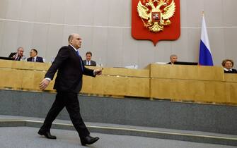 Russian Prime Minister Mikhail Mishustin walks to present the government's annual report at a session of the State Duma, the country's lower house of parliament, in Moscow, on April 7, 2022. (Photo by Dmitry Astakhov / Sputnik / AFP) (Photo by DMITRY ASTAKHOV/Sputnik/AFP via Getty Images)