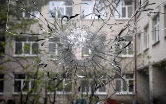 LUGANSK REGION, UKRAINE - APRIL 17, 2022: A close view of a bullt hole in one of the windows in the city of Rubizhne.  With tension escalating in Donbass in February, the Russian Armed Forces launched a special military operation in Ukraine in response to appeals for help from the Donetsk and Lugansk People's Republics.  Stanislav Krasilnikov / TASS / Sipa USA