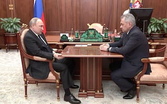April 21, 2022. - Russia, Moscow. - Russian President Vladimir Putin and Defence Minister Sergey Shoigu during a meeting in the Kremlin. Shoigu reported about Russian troops and the DPR People's Militia taking control of the city of Mariupol.