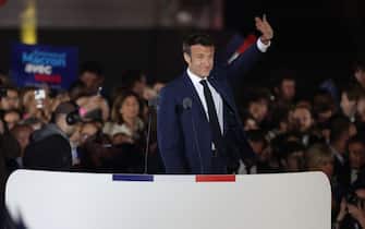 French President and La Republique en Marche (LREM) party candidate for re-election Emmanuel Macron celebrates after his victory in France's presidential election, at the Champ de Mars in Paris, on April 24, 2022. (Photo by Thomas COEX / AFP) (Photo by THOMAS COEX/AFP via Getty Images)
